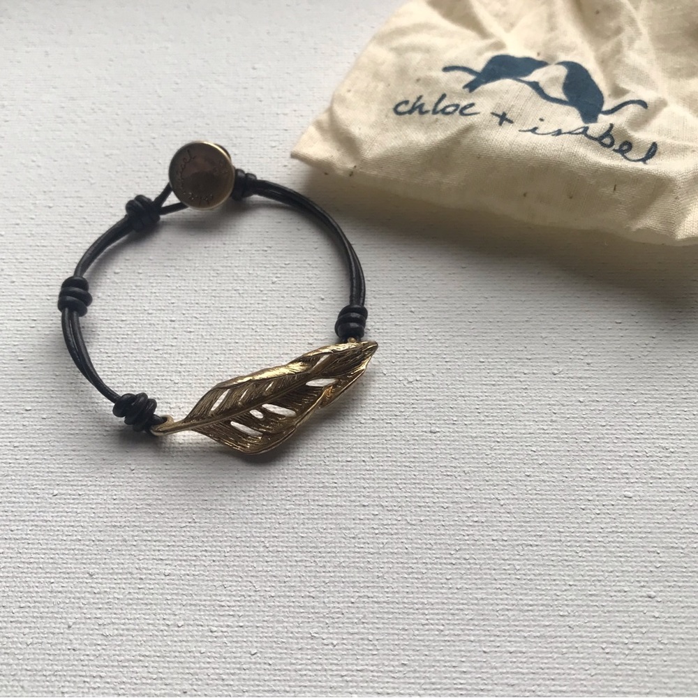 Chloe + Isabel leather bracelet with gold tone feather/leaf accent